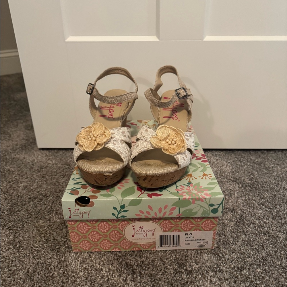 Jellypop Beige and White Wedges with Yellow Floral Accents